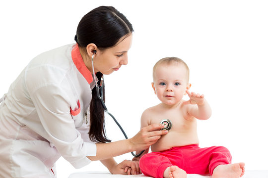 doctor examining baby girl