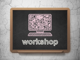 Education concept: Computer Pc and Workshop on chalkboard