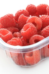 rasberries in plastic tub for retail