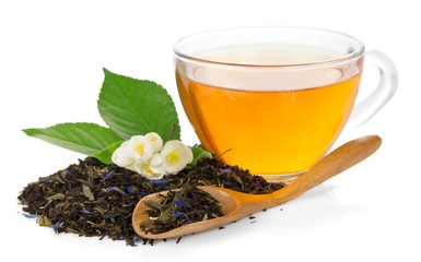 Cup with tea, flower of jasmine