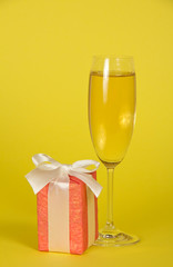 Wine glass, gift box with ribbon and bow