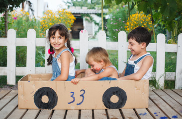 children play in the car