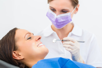 Patient with Dentist - dental treatment