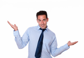 Cute man holding his palms and smiling