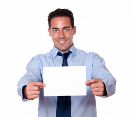 Cute hispanic guy holding a white card