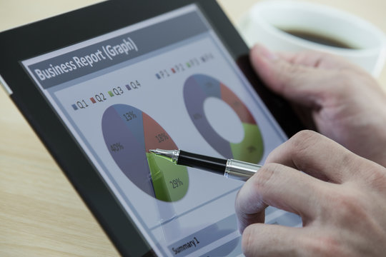 business man working on digital tablet