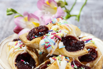 Christmas cookies filled with marmalade, decorated with colorful