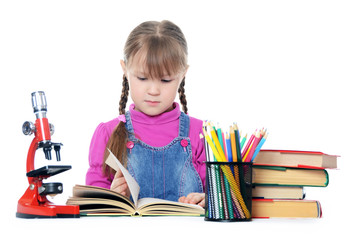 The little girl learn isolated on white background