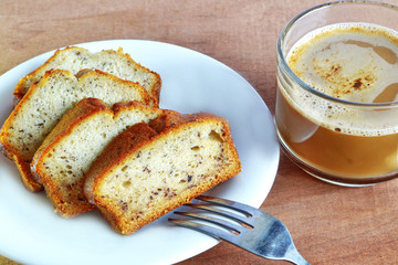 banana cake and a cup of coffee