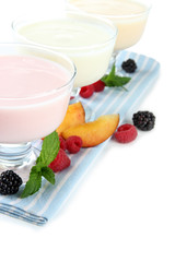 Delicious yogurt with fruit and  berries isolated on white
