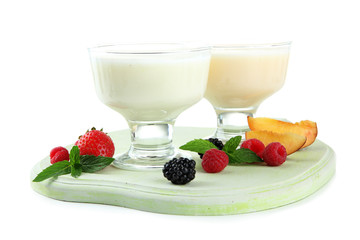 Delicious yogurt with fruit and  berries isolated on white