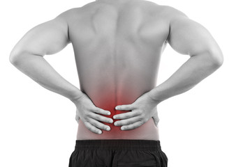 Young man with back pain, isolated on white