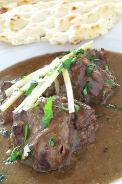 Indian Lamb Nihari Curry with naan bread