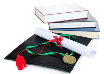 Medal for achievement in education with diploma, hat and books