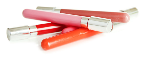Beautiful lip glosses, isolated on white