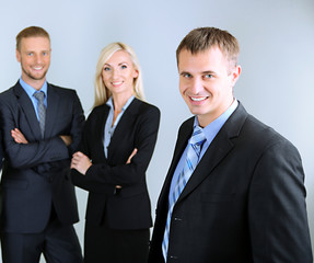 Group of business people on gray background