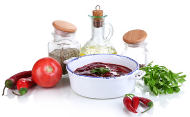 Raw liver in pan with spices and condiments isolated on white