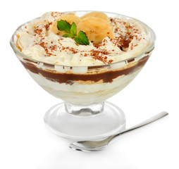 Delicious dessert with banana and caramel isolated on white