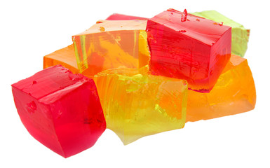 Tasty jelly cubes isolated on white - obrazy, fototapety, plakaty