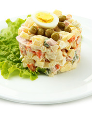 Russian traditional salad Olivier, isolated on white
