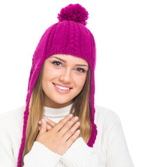 Beautiful teenage girl wearing pink winter hat
