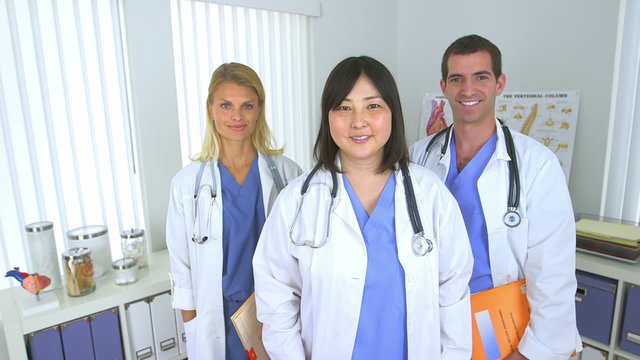 Team of doctors smiling in the office