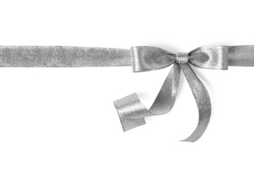 Silver ribbon with bow on white