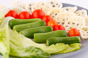 Potato chips and vegetables