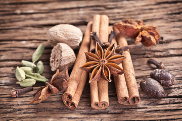 Spices on a old wooden table.