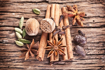 Spices on a old wooden table.