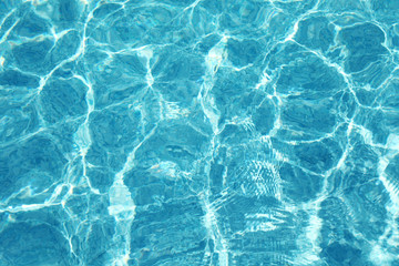 Flecks of sunlight in the water.