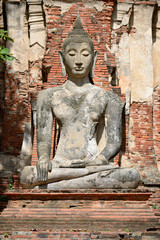 Ancient statue of sitting Buddha in Wat Phra Mahathat, Ayutthaya