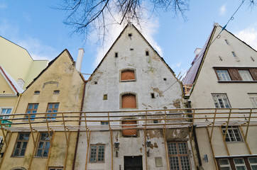 The facade of old buildings requiring restoration