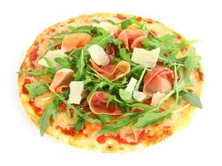 Nutritious pizza with Parma ham, rucola and cheese