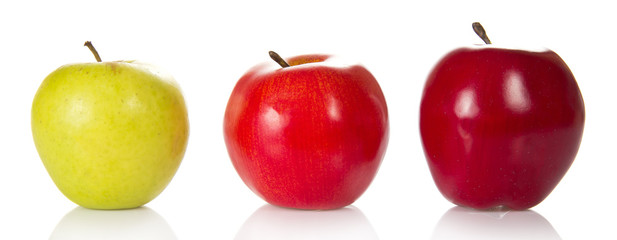 Three colourful apples of different grades