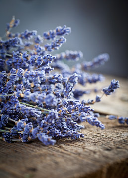 Bunch of lavender flowers on an old wood table