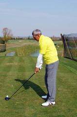 Fototapeta premium senior golf player ready for hit
