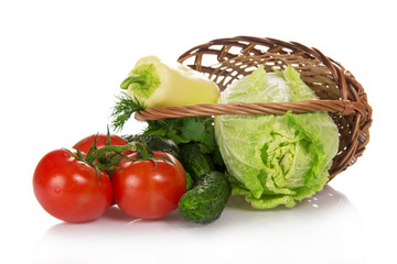 The cabbage, cucumbers, tomatoes in basket
