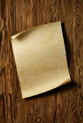 old parchment on aged dark wood