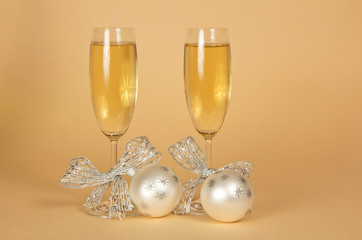 Two glasses with the champagne, decorated silver ribbons