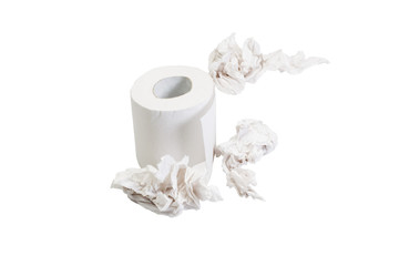 Close-up of a toilet paper roll with crumpled papers