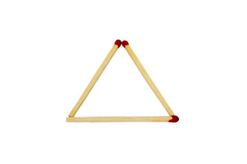 Close-up of a triangle made from matchsticks