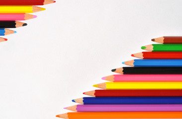 Rows of pencils isolated on white