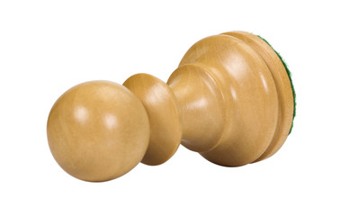 Close-up of a fallen pawn chess piece