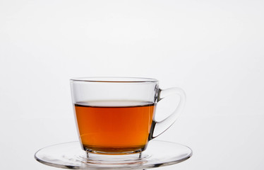 Glass cup of  tea. Isolated on white background