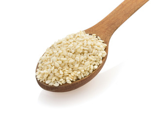 sesame seed in spon on white