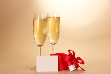 Two glasses, small gift box with card
