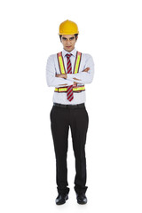 Male architect standing with his arms crossed