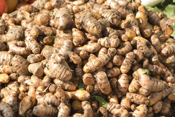 Close-up a heap of raw turmeric, Pushkar, Ajmer, Rajasthan, India