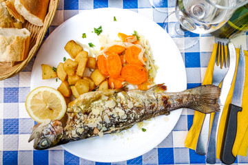 delicious plate of fish and carrot